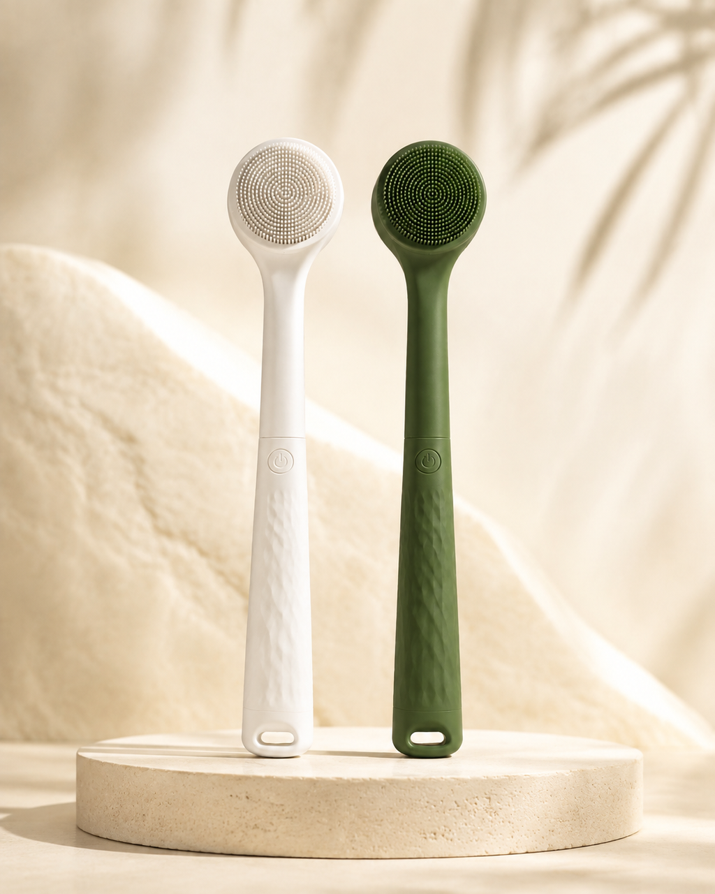 Bristlewell electric body brush in both colorways, white and green, side by side