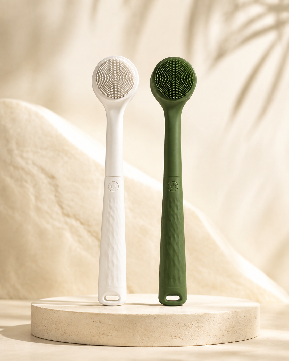 Bristlewell electric body brush in both colorways, white and green, side by side
